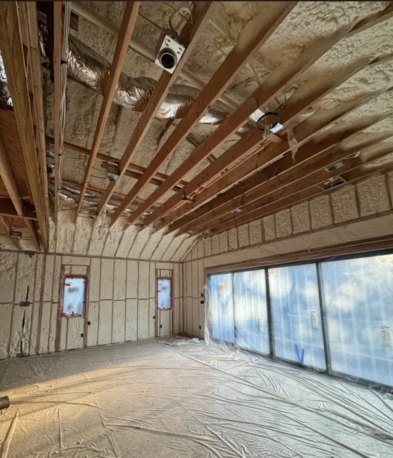 Interior walls and ceiling insulated with spray foam during new construction in Tamarac